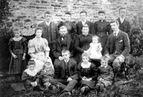 The family of Thomas Richard and Rosie Sanderson with their fifteen children outside Kilnbeck, Dowbiggin, taken in 1893.
