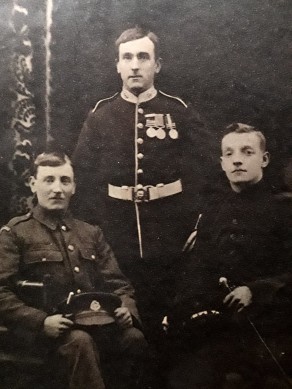 Private George Hitchen (centre) with two of his brothers - perhaps James (left) and Wilfred (right)