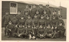 Private Joseph Hale, 2nd row from front, sitting on far left, next to standing soldier