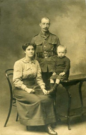 Private John T. Metcalfe with his wife, Sarah Ellen and son