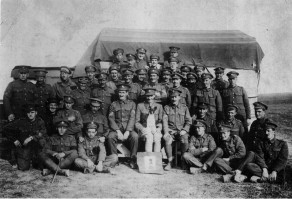Private Henry Kirkley is at the back (middle figure) with his hand on the soldier in front