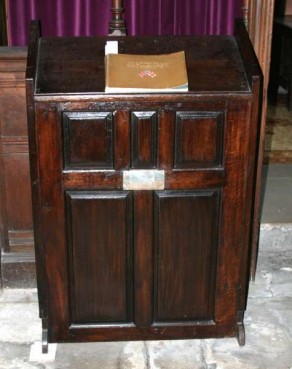 (1c) St Michael's Church: carved oak cabinet with brass plaque (Francis Edward Morkill)